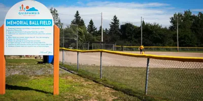 Ball field and players.