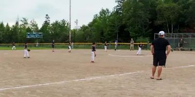 Ball field and players.