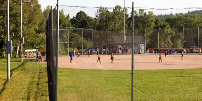 Ball field and players.